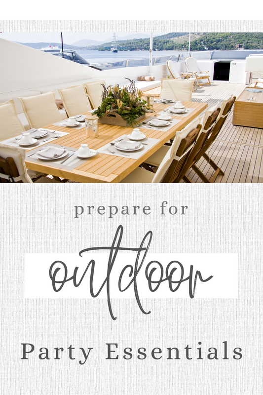 Outdoor party setup with table, chairs, and decor on a patio.Backyard Bliss: The Ultimate Guide to Outdoor Party Essentials for Effortless Entertaining.